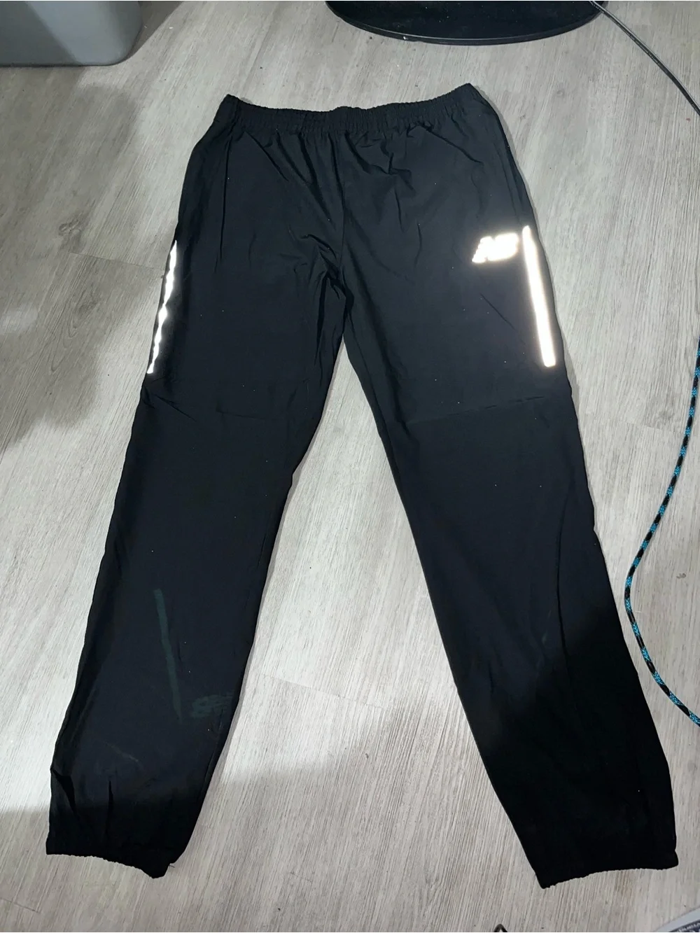 New Balance Black/Gray track joggers with White Logo and Stripe Accents